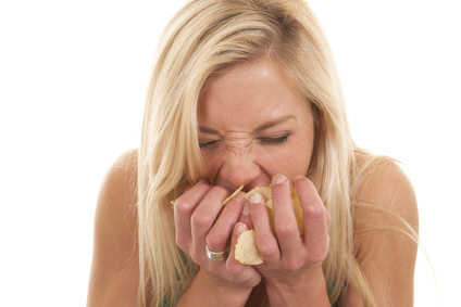 Woman eating ordinary snacks
